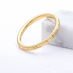 MEASUREMENT: - Band width : 2 mm - Height off Finger : 1.6 mm approx. - Material: 14K - Color: As you order. Available in all colors. - Approx weight : 2 grams - Fit : Comfort Fit This item is also available in 10K, 18K and PLAT. ( Please contact us for quotes ) **If your size is not available, please contact us for the price. This item is MADE TO ORDER. (Rush orders may be possible. Please contact us before placing a rush order. Thank you.) Processing time : 6-10 days Lightning Pendant, Stackable Wedding Bands, Gold Engraving, Stackable Rings, Eternity Bands, Wedding Band, Rush, Unique Pieces, Solid Gold