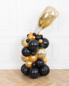 new-years-decorations-balloon-column-champagne-chicago-2023-gold-black-paris312 Pouring Champagne, Champagne Balloon, Gold Champagne Bottle, Champagne Balloons, Balloon Drop, Balloon Pop, 65th Birthday, Space Place, Gold Champagne