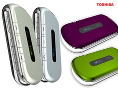 three different colored cell phones sitting next to each other on a white surface with the words toshiba written below them