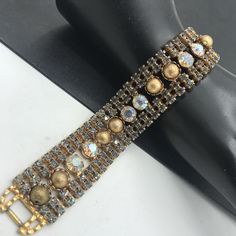 "Vintage Rhinestone Bracelet, 1950's 1960's Fashion, Collectible Jewelry, High End Bracelet, Glass Jewelry, Juliana Bracelet In very good vintage condition. Measures 7 3/4\" x 1\" wide A very classy addition to any vintage jewelry collection. #vintage #jewelry #vintagejewelry #rhinestone #bracelet d33" Juliana Jewelry Vintage, Adjustable Jubilee Bracelet For Evening, Vintage Tennis Bracelet For Wedding, Vintage Jubilee Bracelet For Evening, Gold Tennis Bracelet With 17 Jewels For Party, Vintage Crystal Bracelets For Formal Occasions, Vintage Bling Bracelets As Gifts, Evening Gold Crystal Bracelets, Vintage Metal Bracelets With Bling