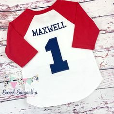 "Baseball One Birthday Shirt - Baseball First Birthday - Baseball Raglan Shirt Your little baseball fan will love celebrating their first birthday in this shirt! The shirt is red and white, and the sleeves are 3/4 length. Measurements of shirts (the best way to measure is to lay a shirt that fits the child on a flat surface and measure while flat): 12 months - 10 inches wide (from arm pit to arm pit) 13 inches long (from shoulder to end seam) 18 months - 10 1/2 inches wide (from arm pit to arm p First Birthday Baseball, Baseball First Birthday, Baseball Theme Party, Baseball Theme, First Birthday Shirts, Boys Tops, Raglan Shirt, Baseball Fan, Raglan Shirts