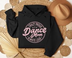 Crazy Proud Always Loud Dance Mom Sweatshirt or T-shirt Multiple Color Options for garment and ink! See photo charts & make it your own! Don't see the size/color/etc option you need? Message us and let's make it happen! ⇝ WOULD YOU LIKE A DISCOUNT? ✓ Buy 2 items & use the code 15OFF to get a 15% discount off your total order!  ✓ Buy 3 or more items & use the code 20OFF to get a 20% discount off your total order! Made to order, the design is printed directly onto the T-shirt!  You haven't ordered yours yet?  Then you should know that this awesome tee comes in a wide range of sizes (up to 5XL) and dozens of color variations! (Quite nice huh?) CREWNECK SPECS: ----------------------------- 8 oz./yd² (US) 13.3 oz./L yd (CA), 50/50 cotton/polyester, 20 singles Heather Sport colors are 60/40 poly Pom Squad, Dance Christmas, Sustainable Manufacturing, Dance Competition, Mom Sweatshirt, Make It Happen, Dance Moms