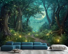 a living room with a couch and large wall mural depicting the forest scene at night