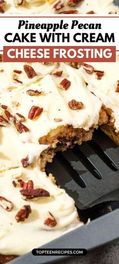 a cake with cream cheese frosting and pecans on top is being held up by a spatula