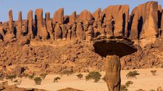 a large rock formation in the desert