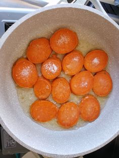 the food is being cooked in the pan on the stove top burners, and ready to be eaten