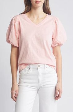 This soft cotton top is designed with a perfectly dipped neckline and eyelet-trimmed puff sleeves. 23" length V-neck Short sleeves 100% cotton Machine wash, tumble dry Imported Casual V-neck Cotton Puff Sleeve Top, Spring Cotton Puff Sleeve Top With Short Sleeves, Cotton Eyelet Puff Sleeve Tops, Cotton Eyelet Tops With Puff Sleeves, Spring Relaxed Fit Puff Sleeve Top With Crew Neck, Spring Relaxed Fit Puff Sleeve Crew Neck Top, Casual V-neck Eyelet Blouse, Feminine Cotton Puff Sleeve Top, Pink Cotton Puff Sleeve Top Feminine Style