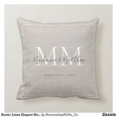 a personalized pillow with the initials and date on it