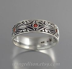 The COUNT silver wedding band with garnet mens unisex ring Blue Sapphire Wedding Band, Jewelry Wishlist, Ring Inspo, Silver Wedding Band, Sapphire Wedding Band, The Count, Sapphire Wedding, Silver Wedding Bands, Men's Wedding Ring