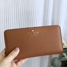 100% Authentic Guaranteed New Kate Spade Dumpling Large Slim Bifold Wallet Warm Gingerbread Ka575 $179 Details Measurements 6.7" W X 3.5" H X 0.94" D Features Metal Pinmount With Spade Logo Closure Type: Snap Closure Dust Bag Included: No Interior: 12 Credit Card Slots, Id Window, 4 Slip Pockets Exterior: Zip Pocket On Back Materials Pebbled Leather Lining: Two Way Spade Jacquard Lining Imported Style Number Ka575 Spade Logo, Bifold Wallet, Kate Spade Bags, Kate Spade Bag, Brown Gold, Pebbled Leather, Snap Closure, Card Slots, Gingerbread