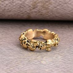 Multi skull ring, Gold Skull Ring, Skull Ring, Horror Ring, Ethnic ring, Skeleton Skull, Skull Head Ring, Gifts For Her, Gothic Skull Ring Metal:- Brass ✦ Our rings are made of high-quality Brass metal and are carefully crafted by hand in our family workshop. The brass metal will develop a nice antique color over time. So, I suggest cleaning it once in a while for getting back to the shiny original color. You can use natural ingredients like lemon or vinegar with water to clean it. Also, apply a thin coat of transparent nail paint/nail enamel on the ring's inner side to save it from being tarnished. ❥ You may request to return the products, 15 days after you received the items (Delivery Day). The buyer is responsible for the shipping costs for the return. (We may have slower production at Horror Ring, Ring Horror, Cool Rings For Men, Punk Skull, Skeleton Skull, Gold Skull, Zierlicher Ring, Head Ring, 2 Rings