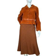 Beautifully Stunning 70's Vintage Burnt Orange Suede Jacket And Matching Wool Skirt Set By Anne Klein. Jacket Features Six Snap Button Closures, Matching 37" Belt, Low Elastic Waist, And Satin Lining. Skirt Is Noted As 100% Wool And Features A Shetland Weave With Black, Brown, And Orange, A 7.5" Side Zipper Closure, And Silk Chiffon Lining. Both Pieces Are Noted As Size 10. The Only Blemish Noted Is There Is Some Wear On The First Belt Hole, Please See Photos For Reference. Overall, This Set Is In Great Condition, It's Quite A Collector's Piece! All Measurements Are Taken Flat. Please Let Me Know If You Have Any Questions. Jacket- Bust: 19.5" Waist: 14.5" - 17" Sleeve Length: 29" Overall Le Brown Skirt Suit For Fall, Fall Brown Long-sleeved Skirt Suit, Fall Long Sleeve Brown Skirt Suit, Fall Brown Long Sleeve Skirt Suit, Brown Long Sleeve Skirt Suit For Fall, Retro Fall Skirt Suit For Formal Occasions, Vintage Fall Skirt Suit For Workwear, Vintage Orange Outerwear For Workwear, Vintage Fitted Skirt Suit For Fall