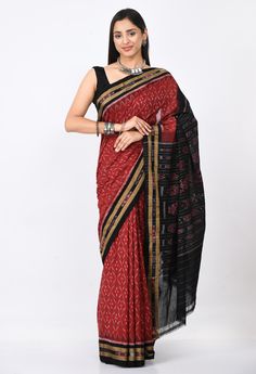 *Presenting this elegant and classy Saree exclusively from Craftnirmit. Made from luxurious fine cotton, the sari is woven within the traditional Ikat Orissa weaver by hand giving an exotic look to the saree. And this saree comes with geometric Patterns. It is further designed with a contrast striped Pallu and temple border that gives the vibrant and classic traditional look. Feel stunning & and style in this traditional ikat saree from Craftnirmit. This saree can be paired with an elegant pair Black Cotton Silk Pre-draped Saree For Diwali, Bollywood Style Black Cotton Silk Pre-draped Saree, Black Bollywood Handloom Pre-draped Saree, Black Pre-draped Saree With Zari Weaving For Puja, Unstitched Black Cotton Silk Saree, Black Cotton Silk Saree, Festive Black Cotton Silk Saree, Black Cotton Silk Saree With Cutdana, Black Handloom Pre-draped Saree For Festivals