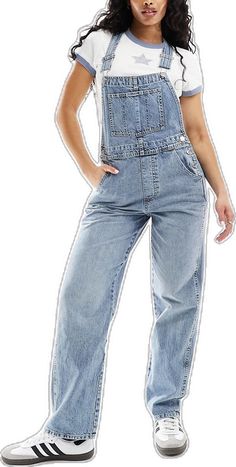 Utility Style High Rise Medium Wash Overalls, Utility High Rise Medium Wash Overalls, Utility High Rise Overalls With Pockets, Utility Denim Overalls With Belt Loops, Casual Denim Overalls With Belt Loops, Denim Blue Jeans Overalls With Suspenders, Trendy Medium Wash Bottoms With Adjustable Straps, Medium Wash Denim Bottoms With Suspenders, Denim Overalls With Adjustable Straps