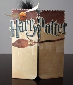 two harry potter bookends sitting on top of a table