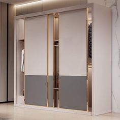 an open closet with sliding doors in the middle and marble flooring on the other side