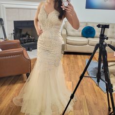 Pageant Dress, Home Coming Dress, Wedding Dress. Beautiful Embellishments, Color Is Beige. The Length Doesn't Run Long For Height 5'4 Or Less. It Fit Me Small Recommended For Someone That Has A Smaller Chest Like One Inch Less, Dress Fit Perfectly Everywhere Else. My Measurements 35-26-37.5. Glamorous Tulle Mermaid Wedding Dress, Champagne Mermaid Dress For Wedding, Elegant Champagne Mermaid Dress For Wedding, Tulle Mermaid Dress For Wedding And Prom Season, Champagne Gown With Sweep Train For Debutante Ball, Glamorous Champagne Wedding Dress With Sweep Train, Champagne Ball Gown For Wedding And Prom Season, Champagne Evening Dress With Sweep Train For Wedding, Elegant Champagne Gown For Debutante Ball