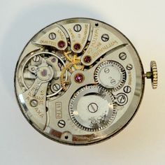 Wittnauer Cal 11TN       Watch Movement For Parts.        The set of train wheels is fourth, third and center wheel.          Feel free to ask any questions. Train Wheels, Watch Movement, Bridge, Wheel, Clock, Feel Free, Electronic Accessories, Train, Purses And Bags