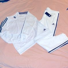 Adidas Triple Stripe Track Suit White With Black Stripes Pants Nwt Size Large Shirt Size Medium Has A Small Spot On Back Under The Arm Excellent Preowned Condition Bv103 Sporty White Long Sleeve Set, White Long Sleeve Athleisure Sets, White Long-sleeved Athleisure Set, White Fitted Athleisure Set, Fitted White Athleisure Set, White Cotton Athleisure Sets, White Athleisure Loungewear Sets, Fitted White Adidas Sets, White Fitted Casual Tracksuit