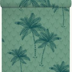 a green wallpaper with palm trees on the back and bottom part of it,