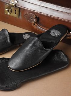 The Troy Travel Slippers in Calf Skin Classic Leather Slippers With Leather Footbed, Luxury Leather Footbed Slip-on Slippers, Luxury Black Leather Slippers, Luxury Slippers With Leather Sole And Calf Leather, Luxury Slippers With Leather Footbed And Round Toe, Luxury Slippers With Leather Footbed, Black Leather Slippers With Leather Lining, Black Leather Slippers With Removable Insole, Classic Black Slippers With Rubber Sole