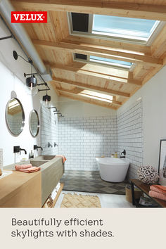 a bathroom with a skylight above the bathtub