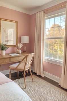 a bedroom with pink walls and white drapes on the windowsill, a desk in front of a large window