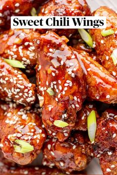 sweet chilli wings with sesame seeds on top and the words, sweet chili wings