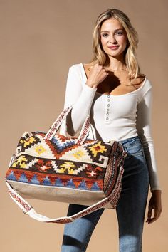 Introducing our bestselling Boho Duffel Bags, the perfect blend of style and functionality for all your travel needs. Made with a 100% cotton shell and a luxurious 100% polyester lining, this duffel bag is built to last and ensure your comfort throughout your travels. Featuring short straps and adjustable shoulder straps, with a 20" handle and a 20"-53" strap, this bag provides a comfortable fit for any body type. With two slip pockets and a zipper pocket inside, you can easily organize your bel Casual Weekender Bag With Adjustable Strap For Trips, Beige Duffle Bag For Weekend Trips, Casual Weekender Shoulder Bag For Overnight Trips, Casual Weekender Bag For Overnight Trips, Casual Beige Bag For Overnight Trips, Casual Shoulder Weekender Bag For Overnight Trips, Beige Tote Weekender Bag For Overnight Trips, Beige Shoulder Duffle Bag For Weekend Trips, Casual Beige Travel Bag For Weekend Trips