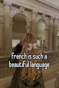 the back of a woman's head with text that reads french is such a beautiful language