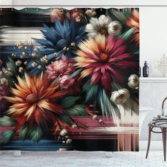 a bathroom with a shower curtain decorated with colorful flowers and leaves on the outside wall