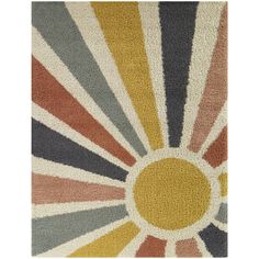 a multicolored rug with sunbursts on the top and bottom in different colors