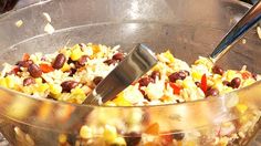 a large bowl filled with rice and beans