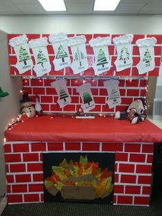 a red brick fireplace with christmas decorations on it