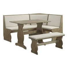 a set of three benches and a table with two seats on each side, all in white upholstered fabric