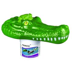 a green alligator head on top of a bottle