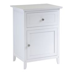 a white cabinet with two doors and drawers