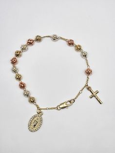 Tri Color Rosary Bracelet 7.5 inches long Charm size 1 inc  Closure Hook Nickel Free Gold Plating 6MM and 3MM Beads  ---------------------------------------  Pulsera rosario tri color mide 7.5  pulgadas Medalla mide 1 pulgada  Con cierre de Gancho  Sin níquel  Baño de oro 6MM y 3MM Rosary Ideas, Rosary Bracelet, Religious Jewelry, Phoenix Az, Tri Color, Rosary, Gold Plating, Labour Day, Beauty Book