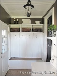 the inside of a house with white cabinets