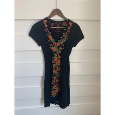 New, Without Tags. Black Short Sleeve Floral Embroidered Midi Dress. V-Neck With Button Detail Around The Neckline. Casual Multicolor Embroidered V-neck Dress, Casual V-neck Dress With Embroidered Neckline, Fitted V-neck Dress With Embroidered Neckline, Casual Embroidered V-neck Dress, Casual V-neck Dress With Multicolor Embroidery, Casual V-neck Embroidered Dress, Black Embroidered Neckline Fitted Dress, Fitted Black Dress With Embroidered Neckline, Fitted Embroidered Dress With V-neck