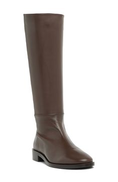 Complete your ensemble in style with this tall leather boot that easily pair with anything in your wardrobe. 15.25" shaft height, 12" opening circumference 1.25" heel Round toe Inner zip closure Leather upper/synthetic sole Made in Spain Leather Knee-high Boots With Leather Lining For Fall, Wide Calf Calf Leather Knee-high Boots For Fall, Fall Wide Calf Knee-high Boots In Calf Leather, Wide Calf Mid-calf Boots In Calf Leather For Fall, Wide Calf Leather Mid-calf Boots For Fall, Fall Wide Calf Knee-high Calf Leather Boots, Faux Leather Knee-high Boots With Leather Lining For Work, Fall Wide Calf Mid-calf Boots In Calf Leather, Tall Leather Mid-calf Boots With Medium Width