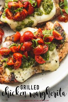 grilled chicken topped with tomatoes and pesto