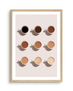 six cups of coffee are arranged on a white background in a wooden frame with shadow