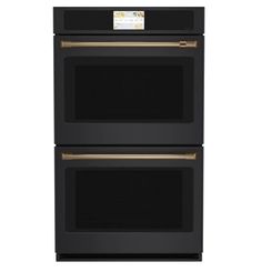 two black ovens side by side on a white background