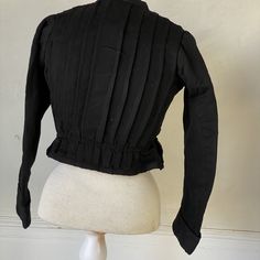 Hello and Welcome to the Textile Trunk! Please follow us on Instagram, we are @textiletrunk This is a lovely bodice in really good shape! It dates to the early 1900s and it feels like cotton to me. I love the wide pleating detail, they add great dimension to the piece! The lining on this piece closes with hook and eyes, and the outer layer closes with snaps. I do not feel any boning in this garment. Truly a great piece for wear or for study! MEASUREMENTS : Length: 17 inches long Chest: 32 inches Lace Apron, French Workwear, Embroidered Bodice, Pleated Blouse, Purple Silk, Eyelet Lace, Early 1900s, Work Shirts, Blouse Black