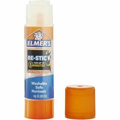 a bottle of glue next to an orange cap on a white background with the word eimers re - stick in it