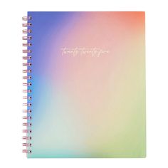 a spiral notebook with the words twenty twenty five written in cursive writing on it