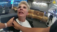 a woman is getting her hair cut at the airport