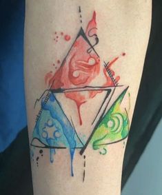 a colorful tattoo on the leg of a person