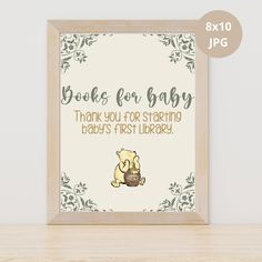 a wooden frame with a baby's first library sign on it, and the words books for baby